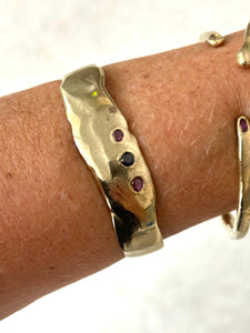 Brass bracelets with sapphires or ruby