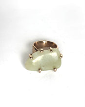 Jade claw set in bronze ring